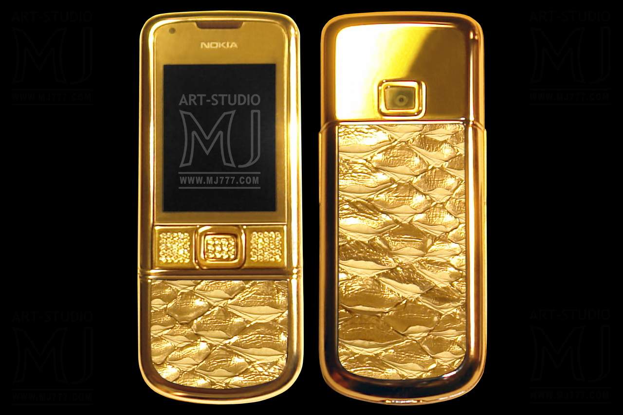 Телефон золотом. Nokia 8800 титановый золотисто бриллиантами. Золотой смартфон. Телефон из золота. Телефон сенсорный золотой.